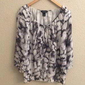 Blouse with black/white, silver thread print.